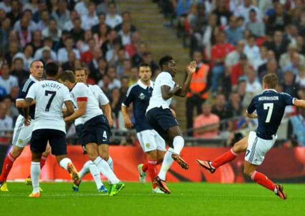James Morrison opens the scoring for Scotland early in the first half. Picture: Getty