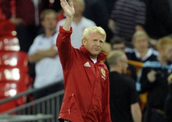 Gordon Strachan saltutes the Scotland supporters at Wembley last night after his side led twice, but were eventually beaten 3-2 by England. Picture:Phil Wilkinson