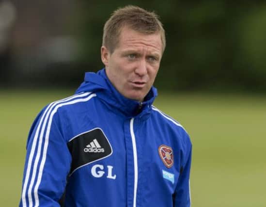 Gary Locke takes training at Riccarton ahead of the Partick Thistle clash. Picture: SNS
