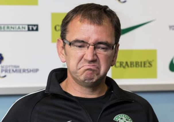 Pat Fenlon's facial expression tells how he feels about one question put to him yesterday. Picture: SNS