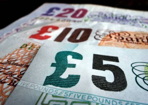 The total equates to £114,000 for every man, woman and child in the UK at the end of 2012, or £275,000 per household. Picture: Getty