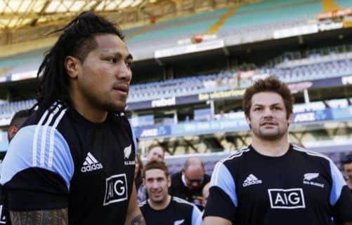 All Blacks Maa Nonu, left, and skipper Richie McCaw leave the field after the teams training session yesterday.  Picture: Reuters