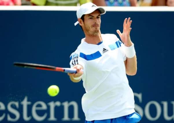 Andy Murray plays a shot during his loss to Tomas Berdych. Picture: Getty