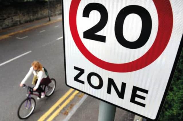 Edinburgh council is now considering extending 20mph zones to all residential and shopping streets and even some main roads after the success of the pilot scheme. Picture: Phil Wilkinson