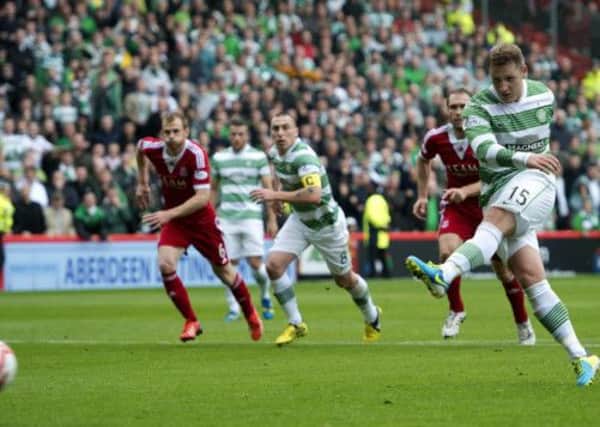 Celtic's Kris Commons fires his side in front from the penalty spot. Picture: SNS