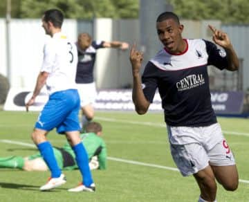 Phil Roberts celebrates after scoring the home side's third of the match. Picture: SNS