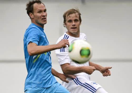 Teemu Pukki, right, in action for Finland against Slovenia. Picture: Getty
