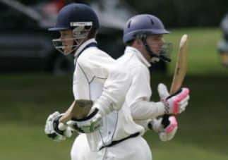 Heriots batsmen Dave Ross, left, and Adam LockhartKrause cross for a run. Picture: Toby Williams