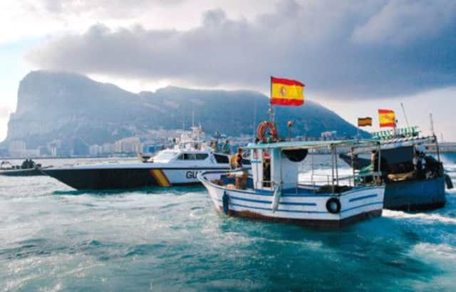 A Gibraltar police launch, left, and a Spanish Civil Guard boat work together to control the protest by Spanish fishermen. Picture: Getty