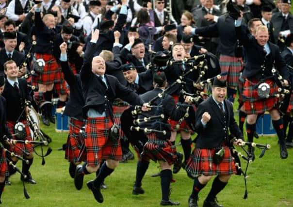 Field Marshall Montgomerie celebrate winning the  2013 World Pipe Band Championships. Picture: Getty