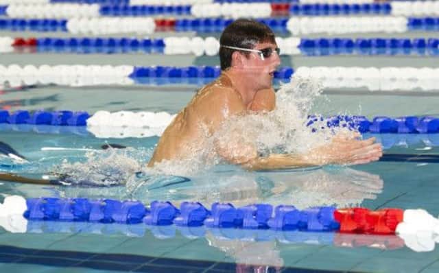 Michael Jamieson limbers up at the Tollcross International Swimming Centre as the Commonwealth Games loom ever larger. Picture: SNS