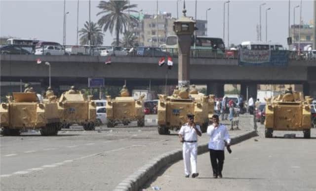 Armoured personnel carriers were seen in central Cairo yesterday. Picture: Mohamed Abd El Ghany/Reuters