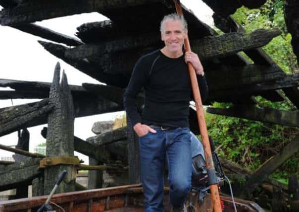 Wildlife film-maker Gordon Buchanan on his boat on the River Clyde in Glasgow. Picture: Robert Perry