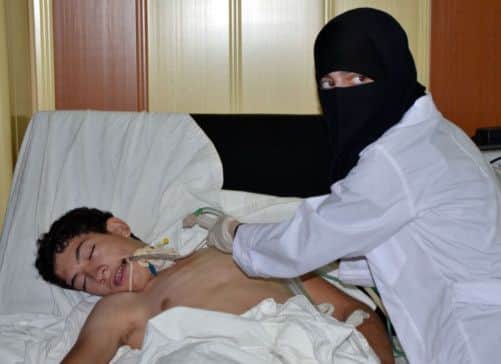 A youth, affected by what activists say is nerve gas, is treated at a hospital in the Duma neighbourhood of Damascus. Picture: Reuters