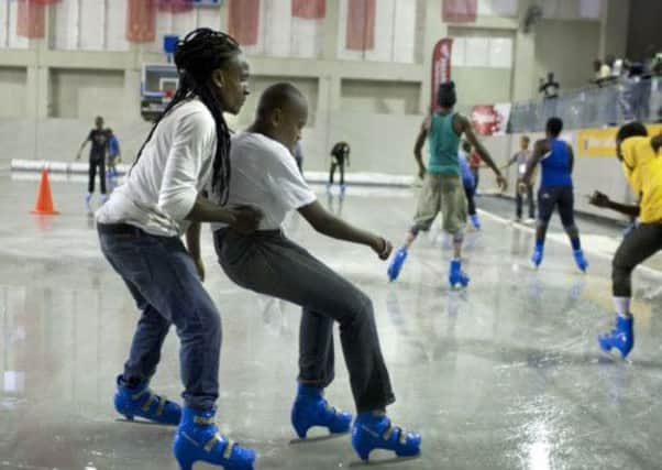 Haitians practice their ice skating skills ahead of the 'Haiti On Ice' event. Picture: AP