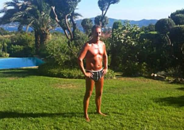 Austrian Freedom Party head Heinz-Christian Strache poses in his bathing suit. Picture: AP