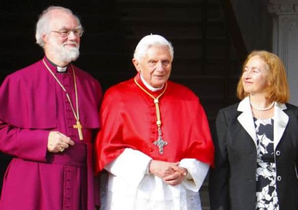 Pope Benedict XVI with the Archbishop of Canterbury and his wife Jane at Lambeth Palace. Picture: PA