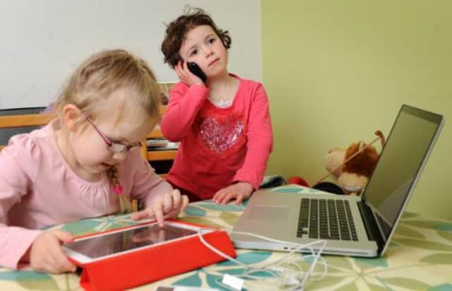 Hung up: one million children have a phone before they go to primary school. Picture: Jane Barlow