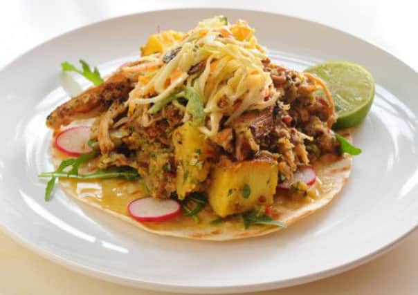 Pork al pastor with caramelised pineapple and jalapeno. Picture: Robert Perry