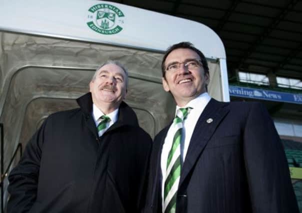 Pat Fenlon insists his job is not safe despite a vote of confidence from club chairman Rod Petrie, left. Picture: SNS
