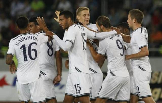 Spurs players congratulate Roberto Soldado, and each other, after the third goal. Picture: Shakh Aivazov/AP