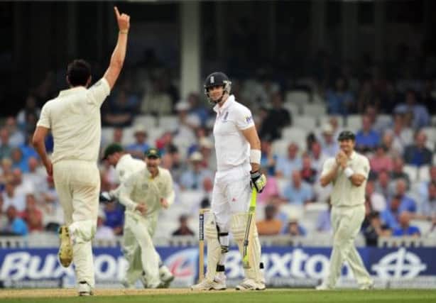 Kevin Pietersen is caught behind by Shane Watson (not pictured) off bowler Mitchell Starc, left. Picture: Getty