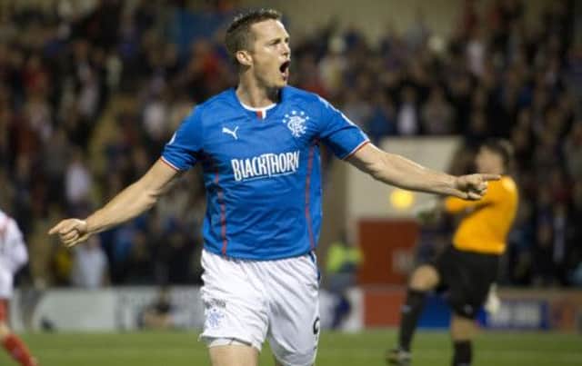 Jon Daly celebrates after getting his first goal for Rangers. Picture: SNS