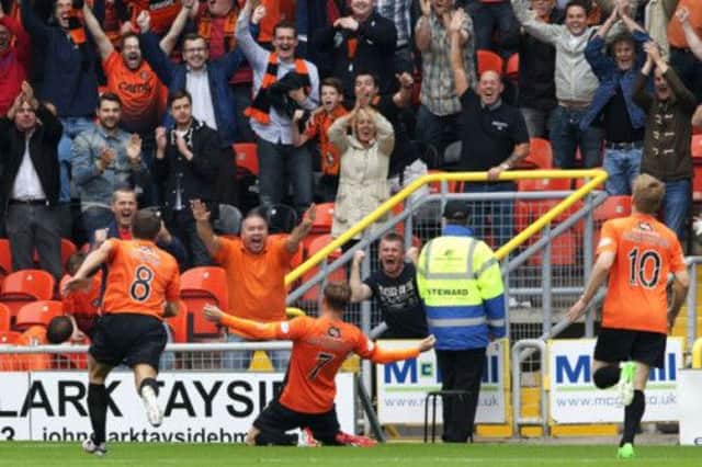 David Goodwillie celebrates scoring Dundee Utd's second goal of the game. Picture: SNS
