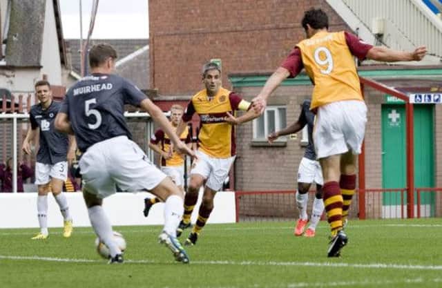 John Sutton scores to give Motherwell a 1-0 lead after 21 minutes. Picture: SNS