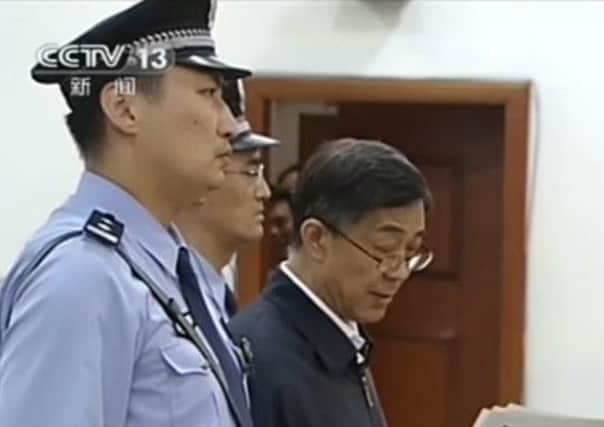 Images from Chinese TV show Bo Xilai reading his final statement to the court. Picture: CCTV/AFP/Getty Images