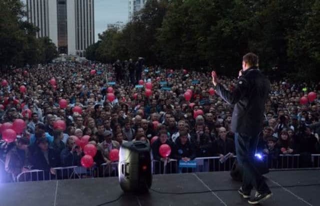 Alexei Navalny speaks to a crowd in Moscow, as he aims to boost his support. Picture: Vasily Maximov/AFP/Getty Images