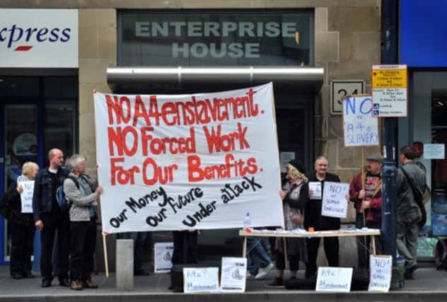 A protest against 'work-for-your-benefits' schemes. Picture: Jane Barlow