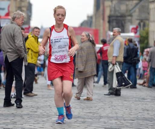 Artist Vicki Weitz   has been running a marathon every day throughout the Festival. Picture: Phil Wilkinson