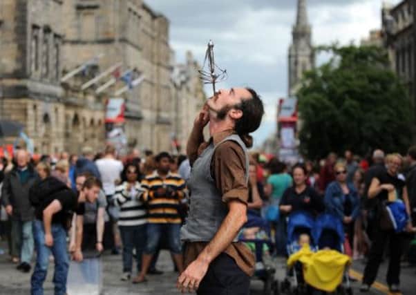 Street performer Luther Bangert on Edinburgh's Royal Mile during the Fringe Festival. Picture: Jane Barlow