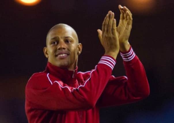 Hamilton's winning goal scorer Mickael Antoine-Curier salutes fans at the end of the game. Picture: PA