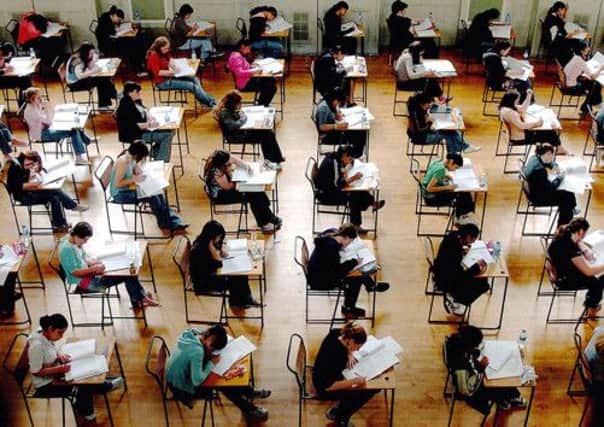 The first students will sit the new National exams this year. Picture: PA