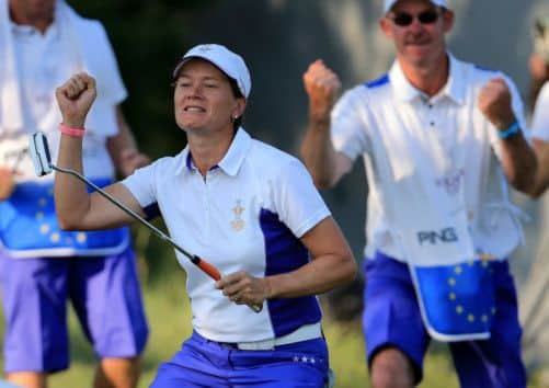 Catriona Matthew celebrates after landing a putt in the 2013 Solheim Cup. Picture: Getty
