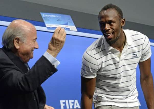 Jamaican sprint star Usain Bolt meets with FIFA President Sepp Blatter at the FIFA headquarters in Zurich. Picture: AP
