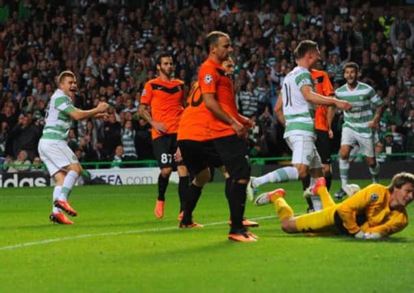 James Forrest wheels away after scoring the third goal. Picture: Robert Perry