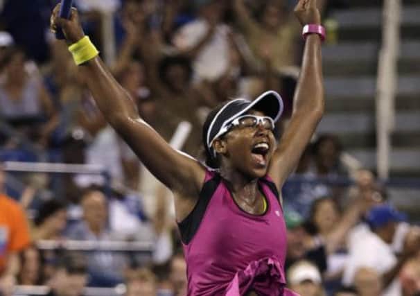 Victoria Duval leaps in celebration after defeating Samantha Stosur. Picture: AP