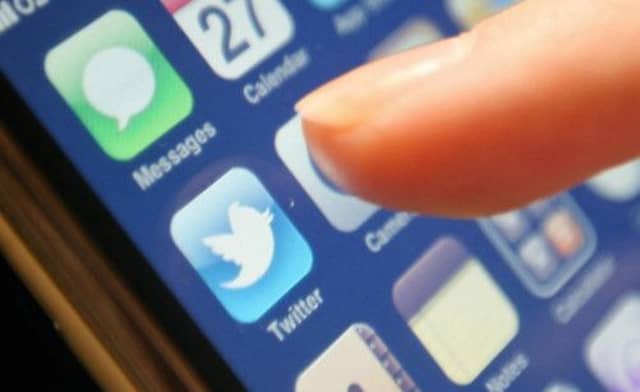 Twitter: introduced a 'report tweet' option. Picture: PA