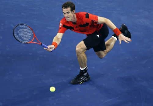 Andy Murray chases down a forehand in his straightsets win over Michael Llodra in the US Open first round. Picture: Reuters