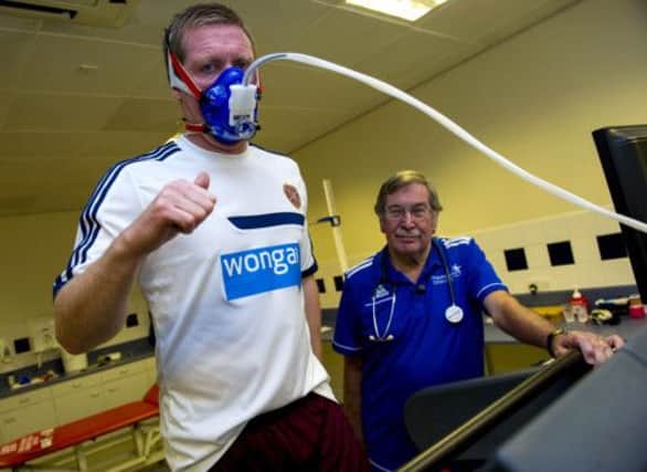 Gary Locke is supervised by Professor Stewart Hillis as he takes part in the new Managers Health Check Project. Picture: SNS
