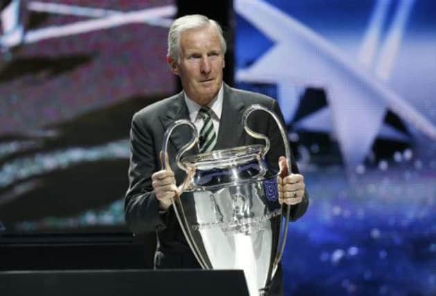 Celtic legend Billy McNeill arrives with the Champions League trophy at group stage draw. Picture: Getty Images