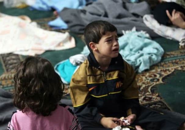 This boy survived the alleged chemical attack on Ghouta. Picture: Reuters
