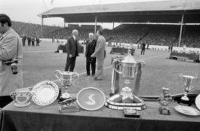 Rangers show off their silverware before their Centenary game against Arsenal at Ibrox in August 1973. Picture: TSPL