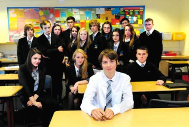 Ian Wilson, front, is the only pupil in his class at Springburn Academy who admits to backing the Yes campaign. Picture: Robert Perry