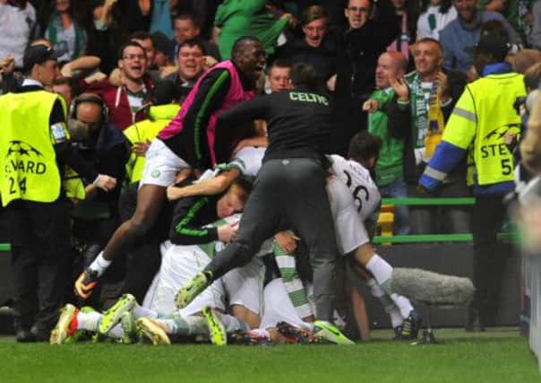 Celtic celebrate the win. Picture: Robert Perry