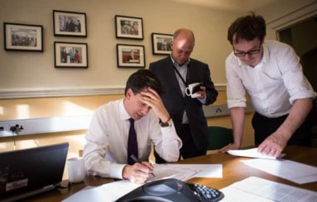 Ed Miliband works in his office  the day after defeat of the Government's plans to take part in military action against Syria. Picture: PA