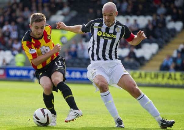 teven Lawless turns away from St Mirren's Jim Goodwin. Picture: SNS